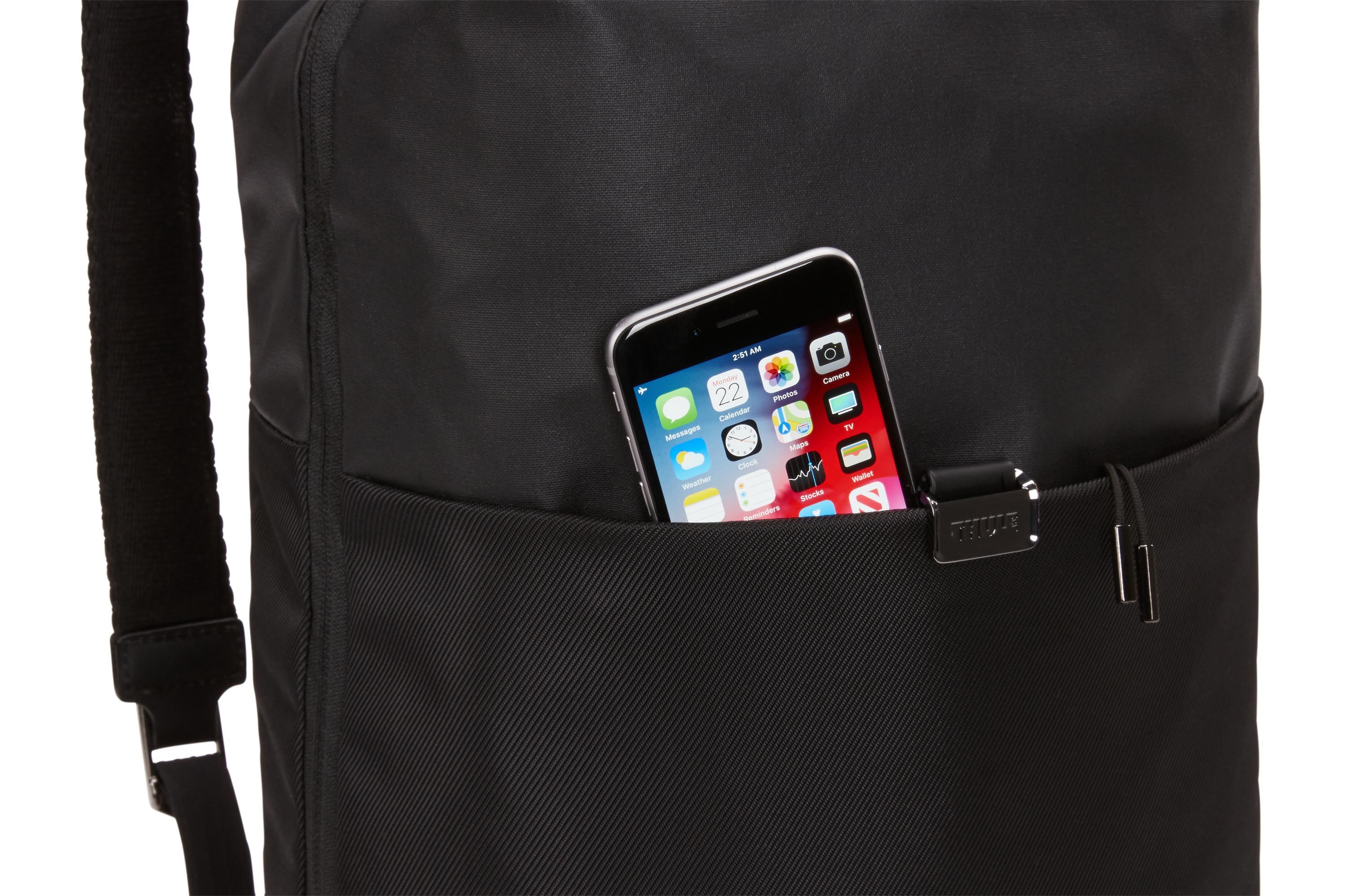 Cell phone in front zippered pocket of Thule Spira Backpack