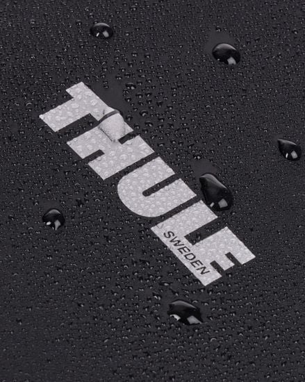 Waterproof Thule Shield pannier with InLock 22L fabric with water droplets