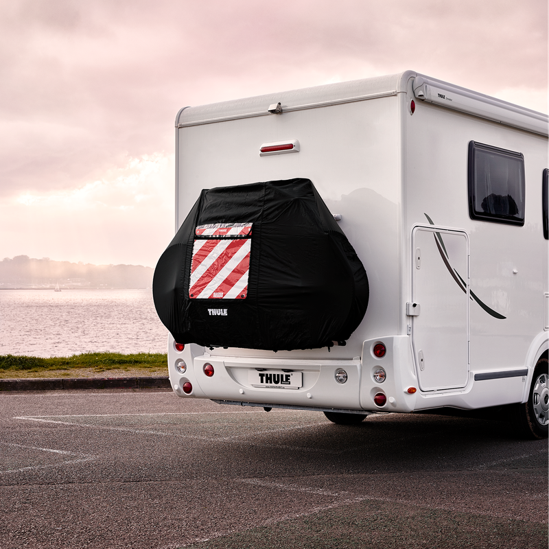 A Thule Rear Warning Sign attached to a Thule Bike Cover attached on a motorhome.