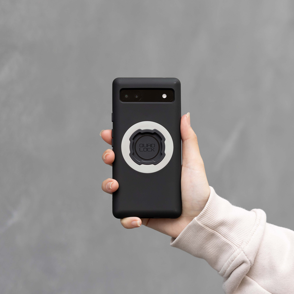 Hand holding Quad Lock MAG Google Pixel case.