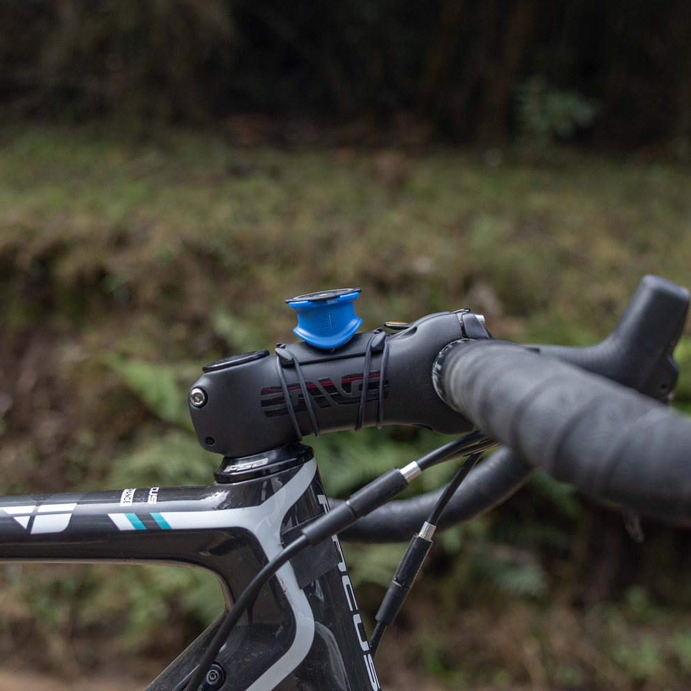 Quad Lock handlebar mount on bike stem.