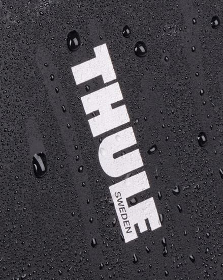 Matériau résistant aux intempéries Thule Chasm courier avec tissu InLock 22L avec gouttelettes d'eau