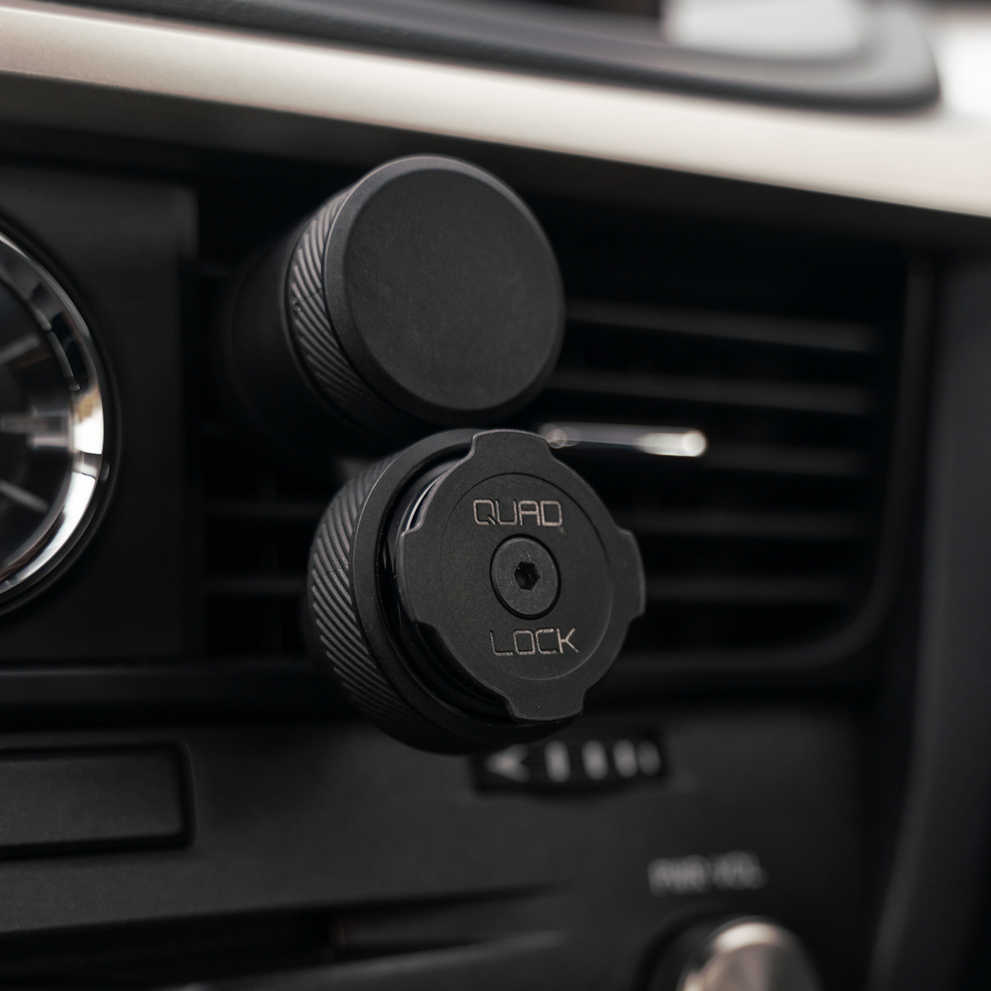 Quad Lock vent mount attached to car air vent.