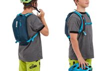 Kid with hydration pack Thule UpTake 6L