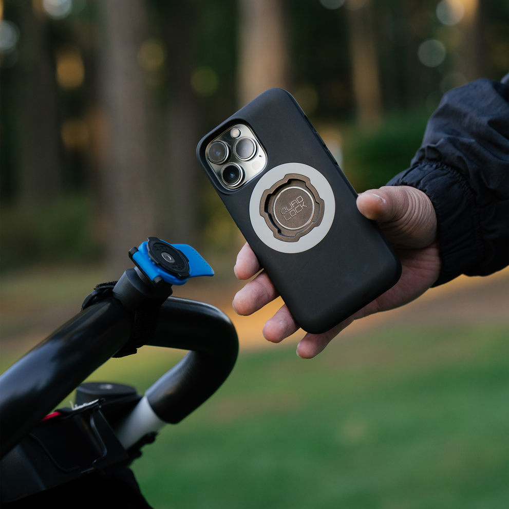 Quad Lock phone case and strap mount on handlebar.