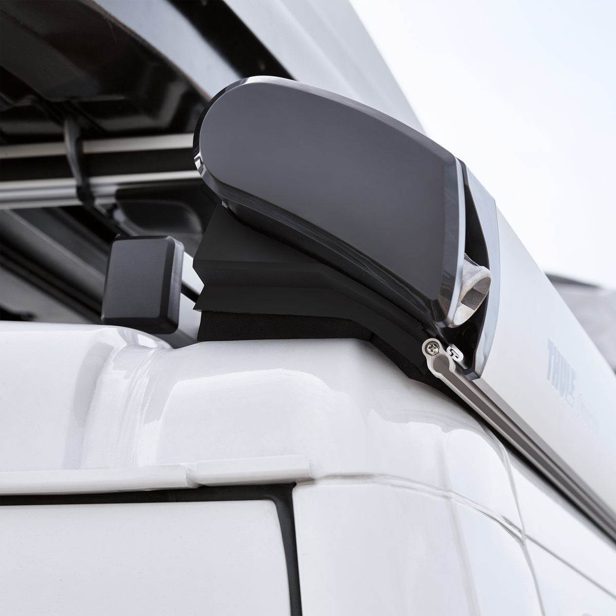 Close up of a Thule SmartClamp System van roof rack on a motorhome.