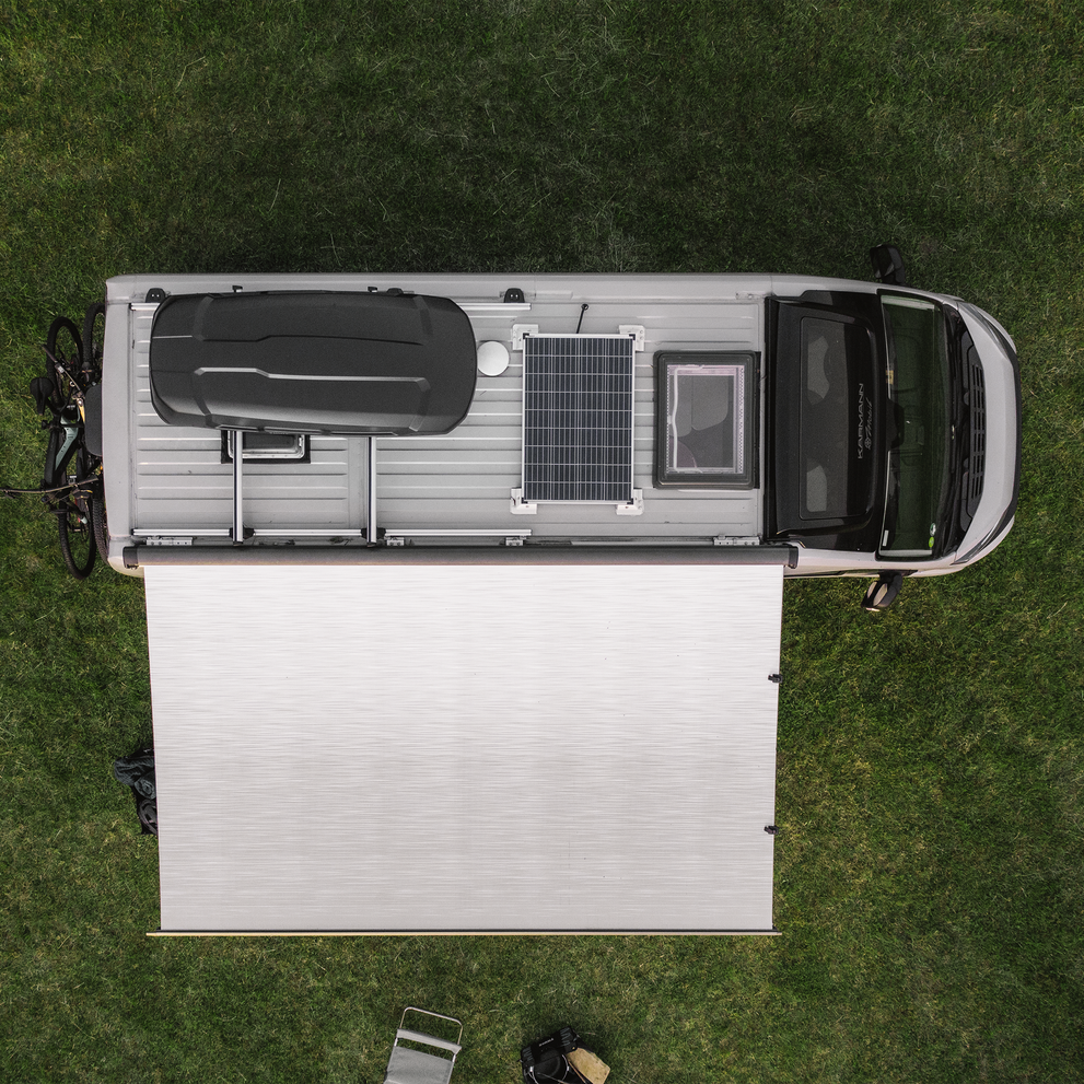 An ariel view of an RV with a Thule SmartClamp System van roof rack.