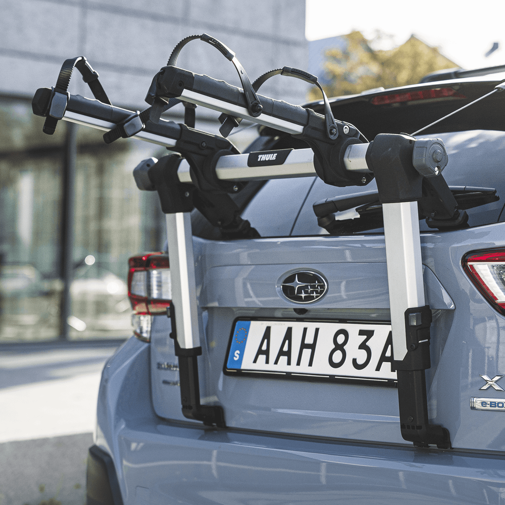 The back of a car with Thule OutWay Hanging bike carrier mounted.