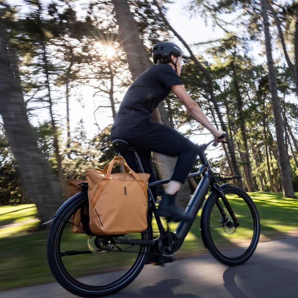 Thule Chasm bag used for everyday cycling in an outdoor setting.