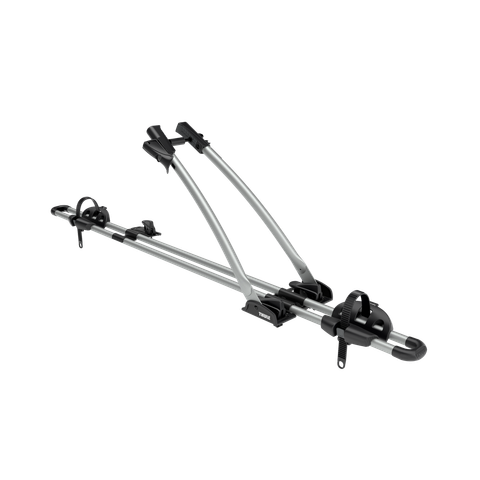 Thule FreeRide bicycle roof rack in aluminum, shown at an angle with the frame holder raised.