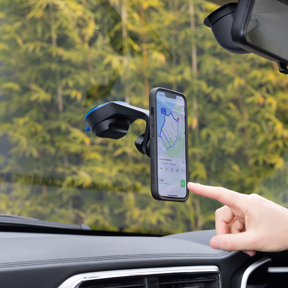 Phone mounted on Quad Lock car mount in use.
