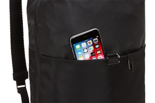Cell phone in front zippered pocket of Thule Spira Backpack
