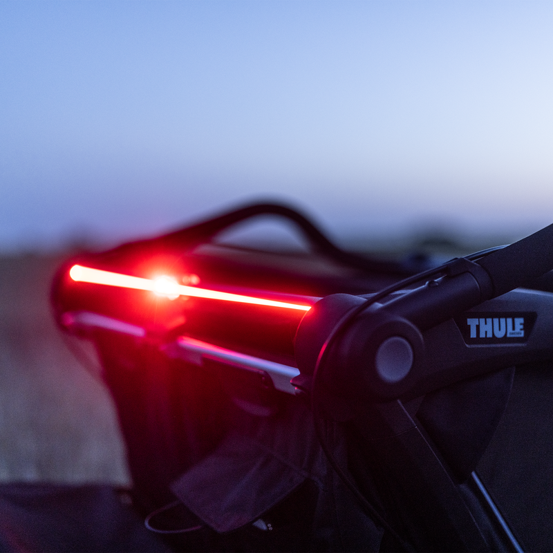 A close up of the integrateed LED lighting on the Thule Chariot bike trailer.