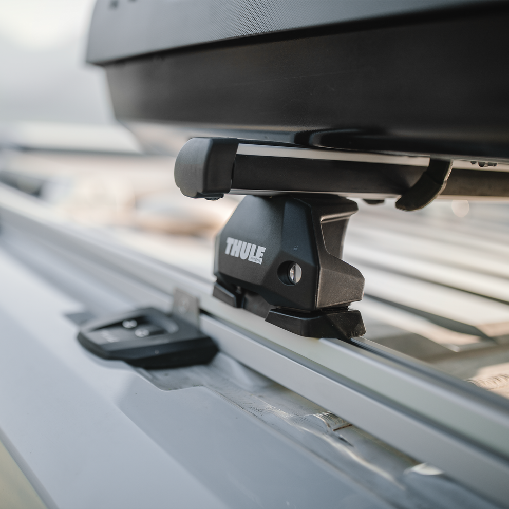 Close up of a Thule SmartClamp System van roof rack on a motorhome.