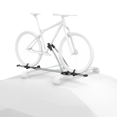 Ghosted illustration of a bicycle secured upright to an aluminum Thule FreeRide mounted on a vehicle roof.