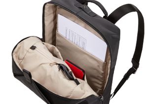 Interior slip pockets and zippered compartment of Thule Spira Backpack