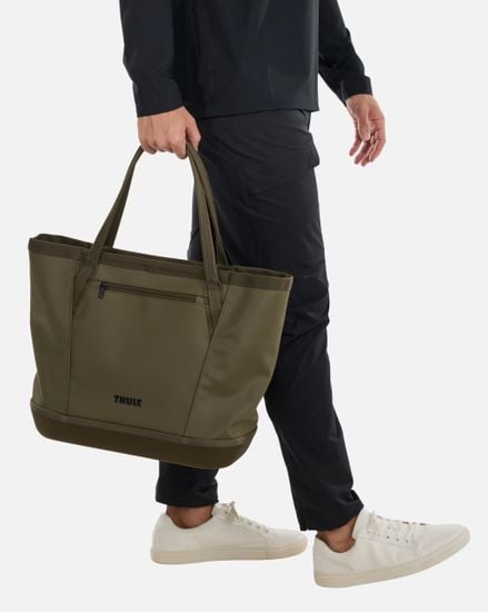 Thule Chasm gear tote 30L carried by hand