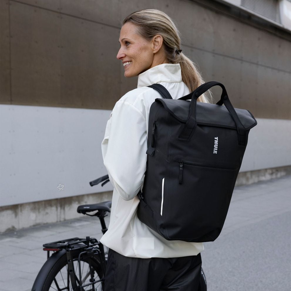 Thule Shield backpack worn off the bike in an urban setting.