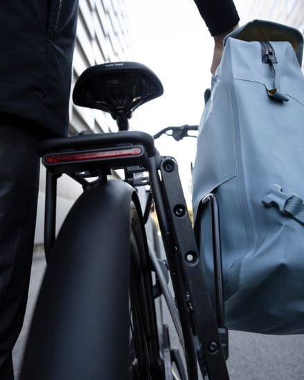 Thule Chasm courier with InLock 22L attached with the InLock mounting system