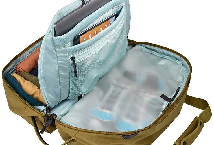 Et tpu-rum i en Thule Aion rejsetaske er perfekt til at opbevare sko i.