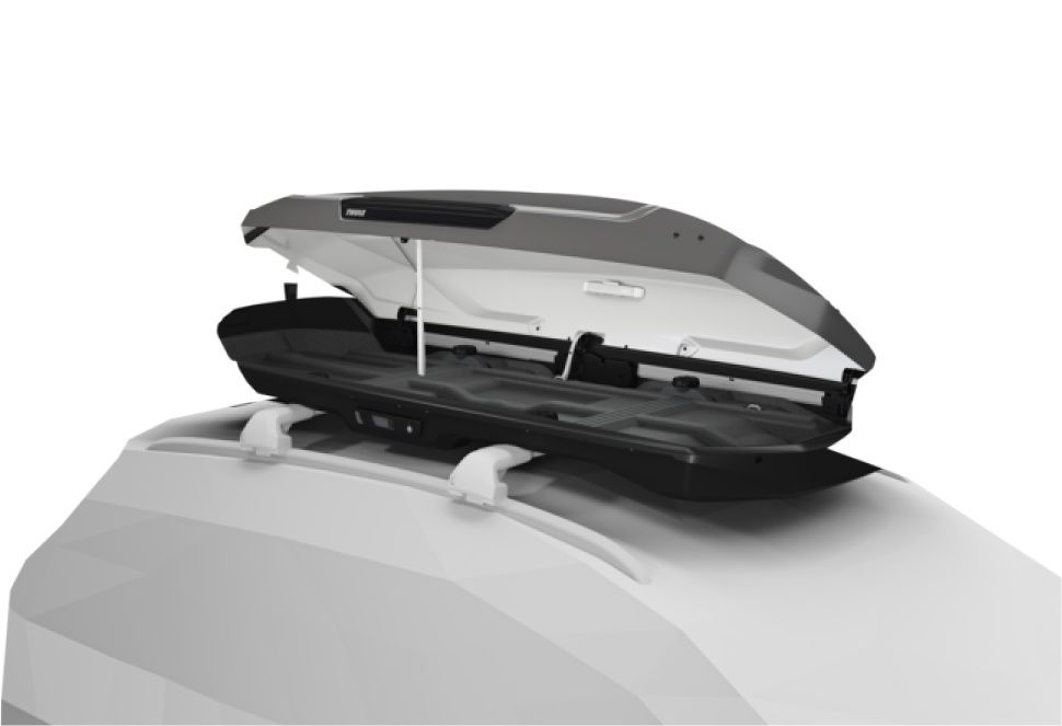 An image of the Thule Motion 3 roofbox showing the interior with the lid lifted.