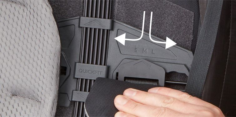 A close-up picture of how to use a feature on one of the travel backpacks.