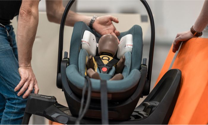 A Thule car seat is being crash tested in the Thule Test Center.