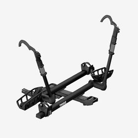 Hitch bike rack with a gray background.