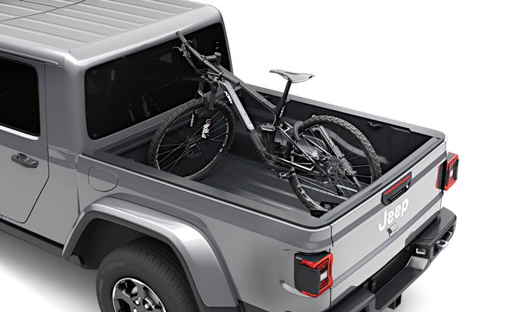 A Thule InstaGater Pro truck bed bike rack carrying two bikes