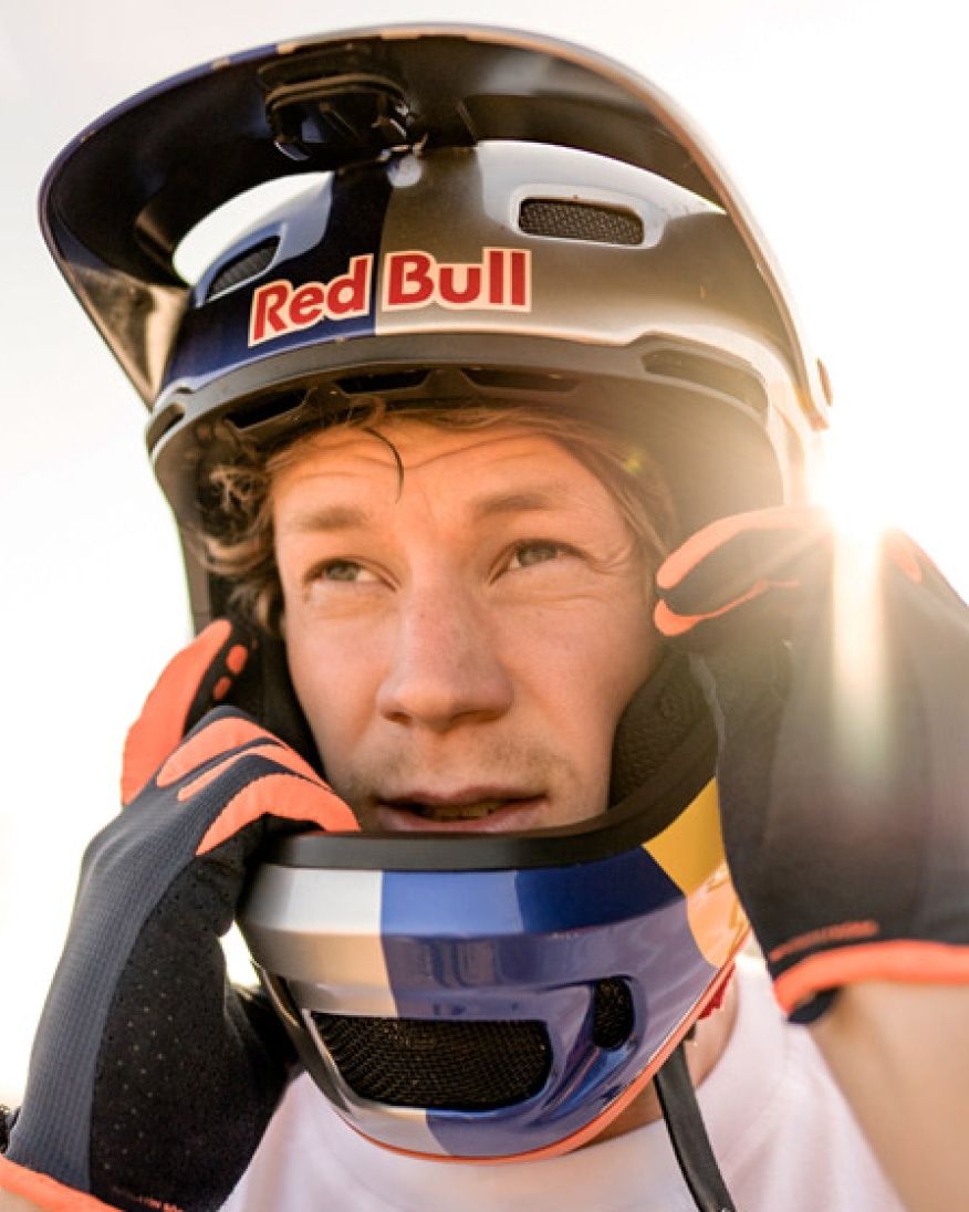 A close up image of Martin Söderström wearing a bike helmet.