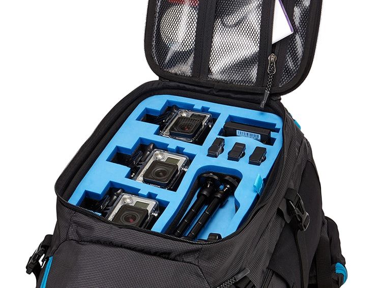 A close-up of one of the camera backpacks with an open pocket revealing compartments for your equipment.
