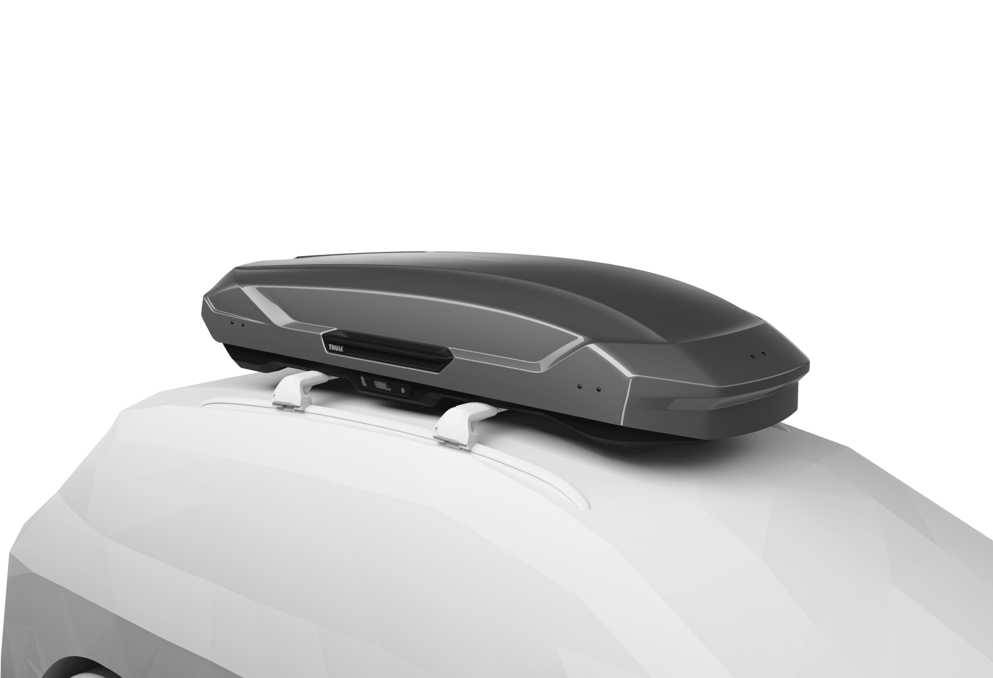 An image of a closed Thule Motion 3 roofbox mounted to the top of a vehicle.
