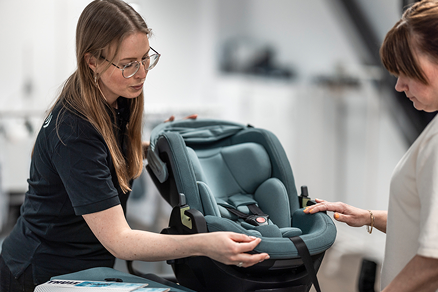 Thule child car seat safety testing in laboratory for impact protection.