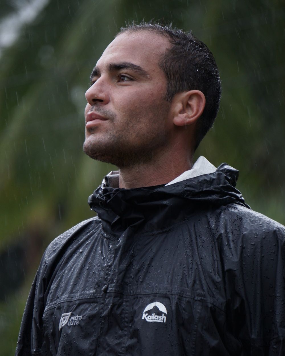 A close up image of Pedro Oliva wearing a black jacket.