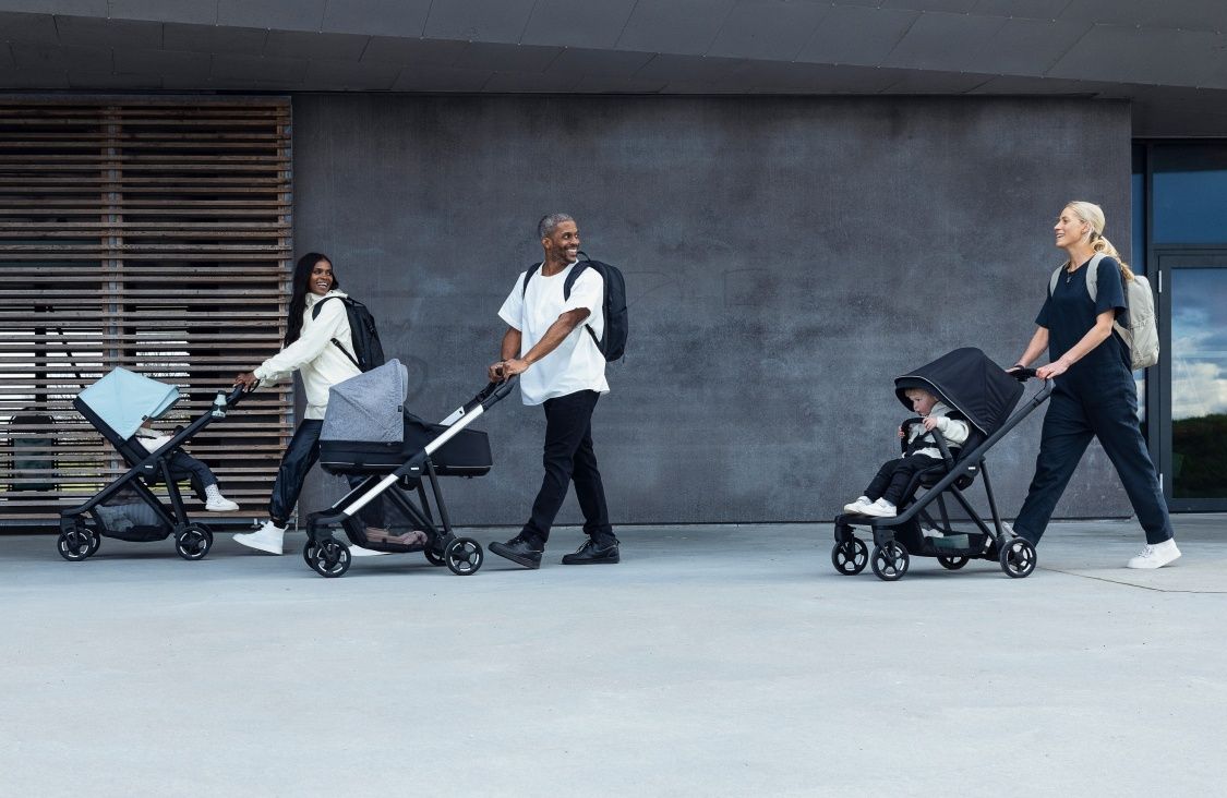 Three parents walk with their kids in compact city strollers with the best stroller accessories from Thule.
