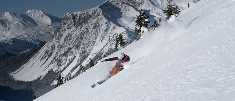 Lorenzo Alesi skis down the steep slope at Rogers Pass in Canada.