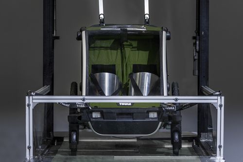A bike trailer is being tested in the Thule test center durability test.