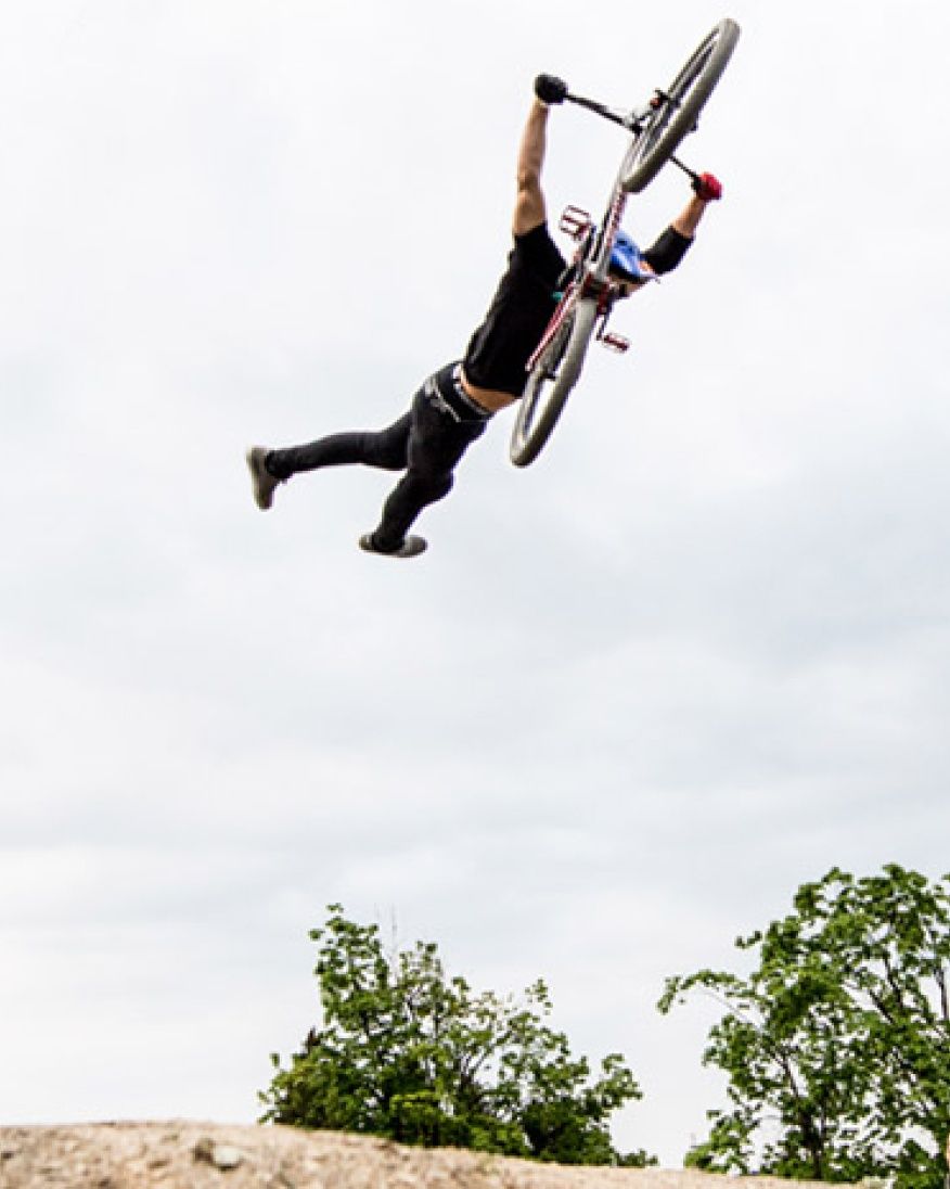 Martin Söderström does a bike trick in the air.