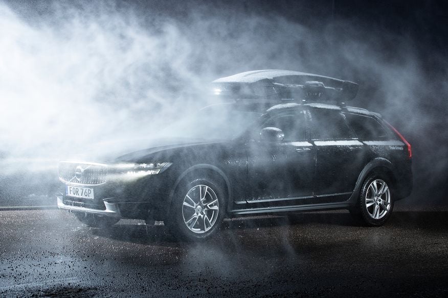 Thule roof box is exposed for extreme weather testing in snowy driving conditions.